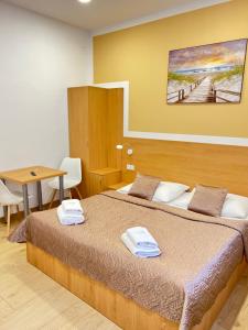 Posteľ alebo postele v izbe v ubytovaní Rabie Aparthotel