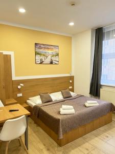 Posteľ alebo postele v izbe v ubytovaní Rabie Aparthotel
