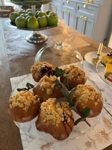 a plate of pastries sitting on a table at Farma Bii in Brzeziny