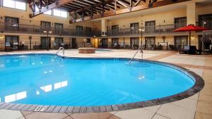 a large pool in the middle of a building at Best Western Plus New Ulm in New Ulm