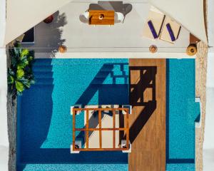 a model of a house with a pool at Emerald Villas & Suites - The Finest Hotels Of The World in Agios Nikolaos