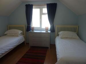 Ένα ή περισσότερα κρεβάτια σε δωμάτιο στο Tides Reach - Trebarwith Strand - North Cornwall - Sleeps 4 - 6