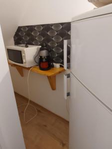 Kuchyňa alebo kuchynka v ubytovaní Corner Apartman 5