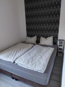 Posteľ alebo postele v izbe v ubytovaní Corner Apartman 5