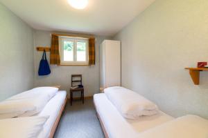 Säng eller sängar i ett rum på Wiesel