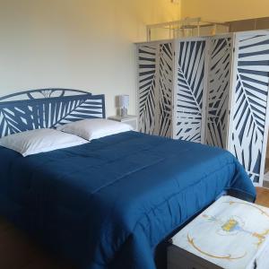 מיטה או מיטות בחדר ב-Maison Lumineuse entre Toulouse et Albi