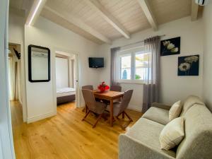 Et tv og/eller underholdning på Il Tramonto by Great Stays