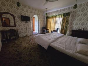Letto o letti in una camera di The Citadel
