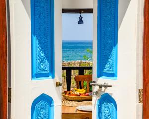 a room with a view of the ocean at Salaam Space in Muscat