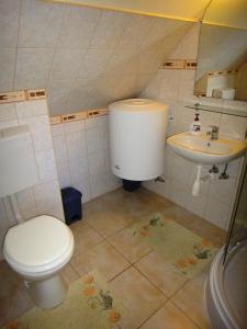 Kúpeľňa v ubytovaní Ginkgo Apartman