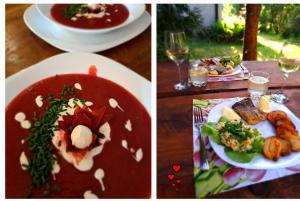 a table with plates of food and glasses of wine at Agroturystyka u Krzysztofa i Mileny Kocioł Duży in Pisz