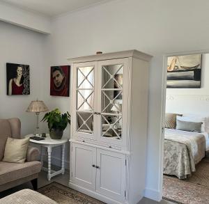 Ένα ή περισσότερα κρεβάτια σε δωμάτιο στο Somerset West Garden Apartments 3