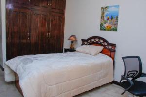 A bed or beds in a room at Residencia encantadora en La Paz