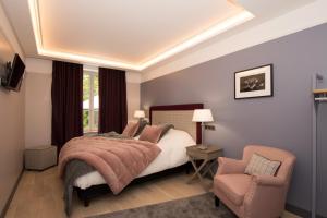 Postel nebo postele na pokoji v ubytování Gîte L'Escale des Aulnes + 12 fotografií