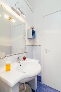 Kúpeľňa v ubytovaní Caio Asinio Apartment
