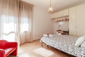 Posteľ alebo postele v izbe v ubytovaní Caio Asinio Apartment