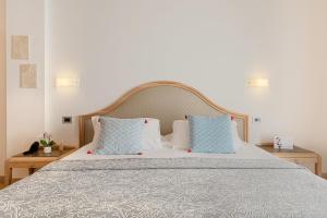 Rúm í herbergi á Park Hotel Argento