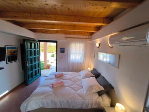 Postel nebo postele na pokoji v ubytování Apartment Leonarda