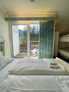Apartment Berghof Ellmau客房内的一张或多张床位