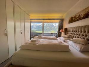 Apartment Berghof Ellmau客房内的一张或多张床位