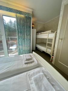 Apartment Berghof Ellmau客房内的一张或多张床位