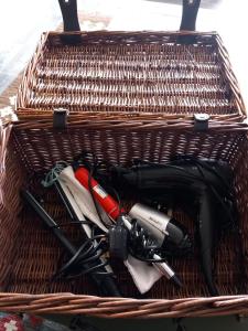 a basket full of tools in a basket at Jasmine Haus in Moortown