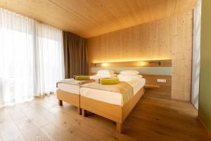 Postel nebo postele na pokoji v ubytování Hotel Heffterhof