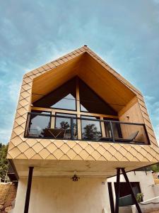 a house with a large window on top of it at Adventure Camp Schnitzmühle in Viechtach