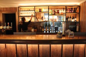 Lounge nebo bar v ubytování Olarsgården Hotell