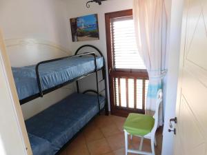 Ένα ή περισσότερα κρεβάτια σε δωμάτιο στο Appartamento Residence Mirice