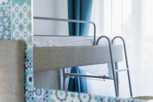 Postel nebo postele na pokoji v ubytování Hotel Miramare
