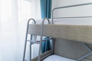 Postel nebo postele na pokoji v ubytování Hotel Miramare
