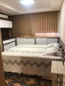 Postel nebo postele na pokoji v ubytování Apartamento confortável quadra mar + 15 fotografií