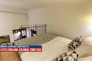 Postel nebo postele na pokoji v ubytování Little Americas USA Colonial Times Apartments