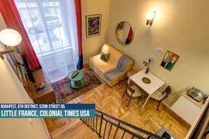Posezení v ubytování Little Americas USA Colonial Times Apartments