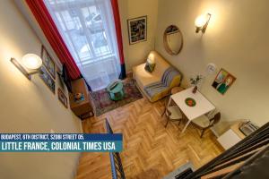 Posezení v ubytování Little Americas USA Colonial Times Apartments