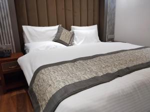 Postel nebo postele na pokoji v ubytování Western Blu INN