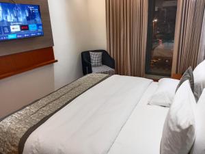 Postel nebo postele na pokoji v ubytování Western Blu INN
