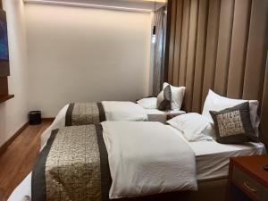 Postel nebo postele na pokoji v ubytování Western Blu INN