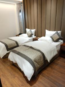 Postel nebo postele na pokoji v ubytování Western Blu INN