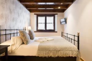 Luderna - Apartamento Val de Ruda A18 les Marmottes房間的床
