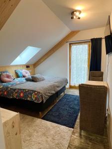 Postel nebo postele na pokoji v ubytování Hoeve Consensus Texel