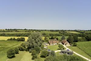 an aerial view of a house in a field at Selwood Cottage in Beckington