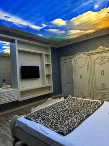 OqDaryo Hotelにあるベッド