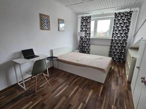 Posteľ alebo postele v izbe v ubytovaní Przestronny Apartament z szybkim WiFi