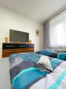 Postel nebo postele na pokoji v ubytování Moderne Ferienwohnung Felbbauer #30