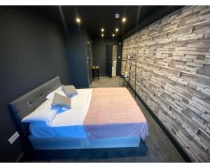Postel nebo postele na pokoji v ubytování Amsterdam Hotel