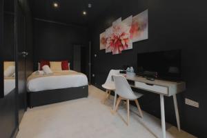 Postel nebo postele na pokoji v ubytování Amsterdam Hotel