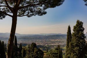 a view of the city from the hills at FH55 Hotel Villa Fiesole in Fiesole