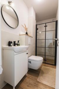 Koupelna v ubytování Flexible SelfCheckIns 76 - Zagreb - Arena - Bedroom - New